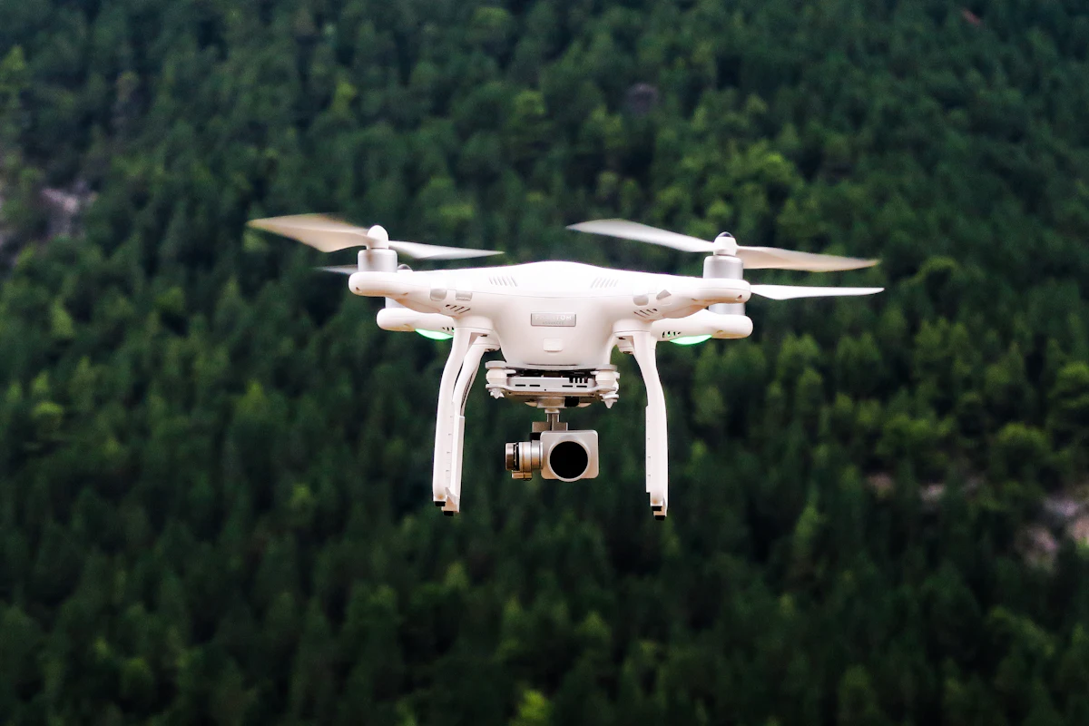 A drone flying against an open sky